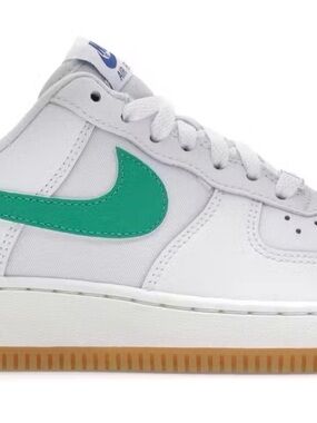 Nike Women's White Athletic Sneakers with Green Swoosh